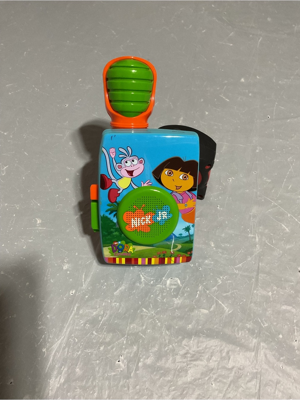 Nickelodeon Dora the Explorer portable cassette player with a microphone.